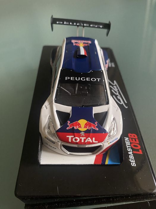 Miniatura esc. 1/43 de Sébastien Loeb”Peugeot 206 T16 Pikes Peak 2013”