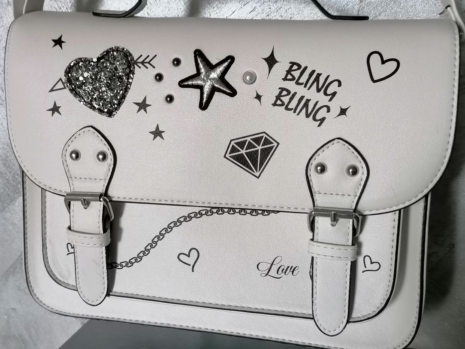 Nowa listonoszka większa z metką