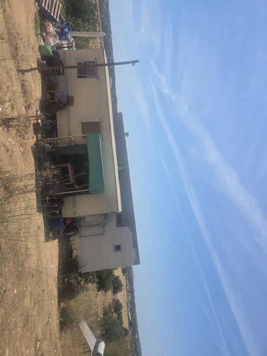 Terreno com casa modelar