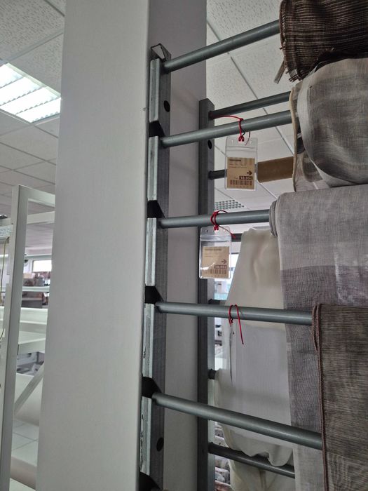 Expositor de Rolos entre Paredes