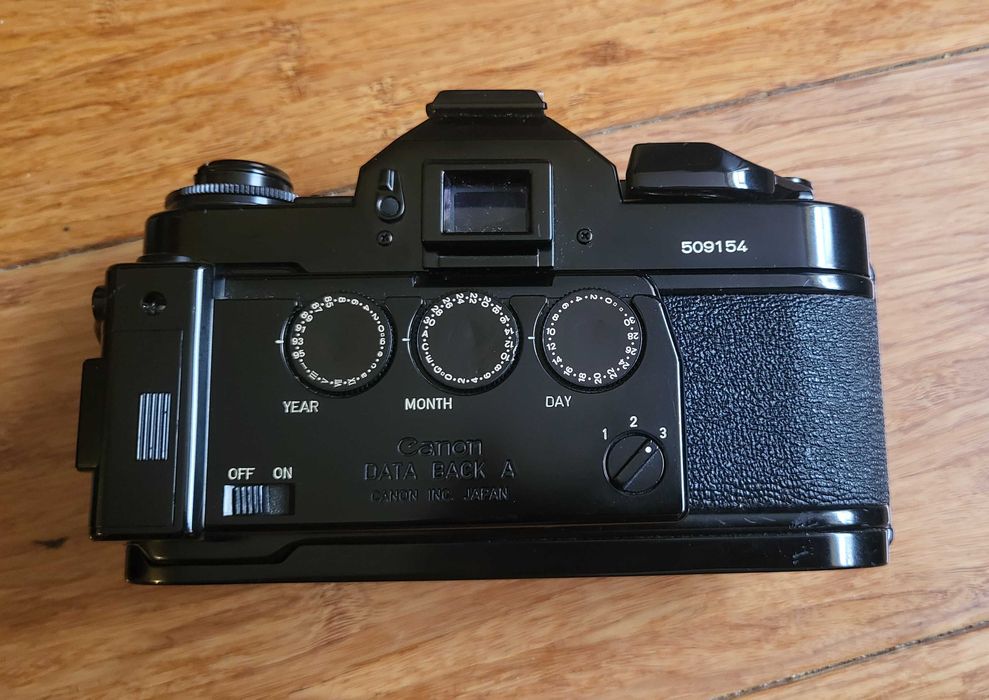 Zestaw aparat Canon A1, obiektyw, komplet konwerterów i torba