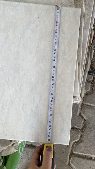 16 azulejos = 1.6 metros quadrados