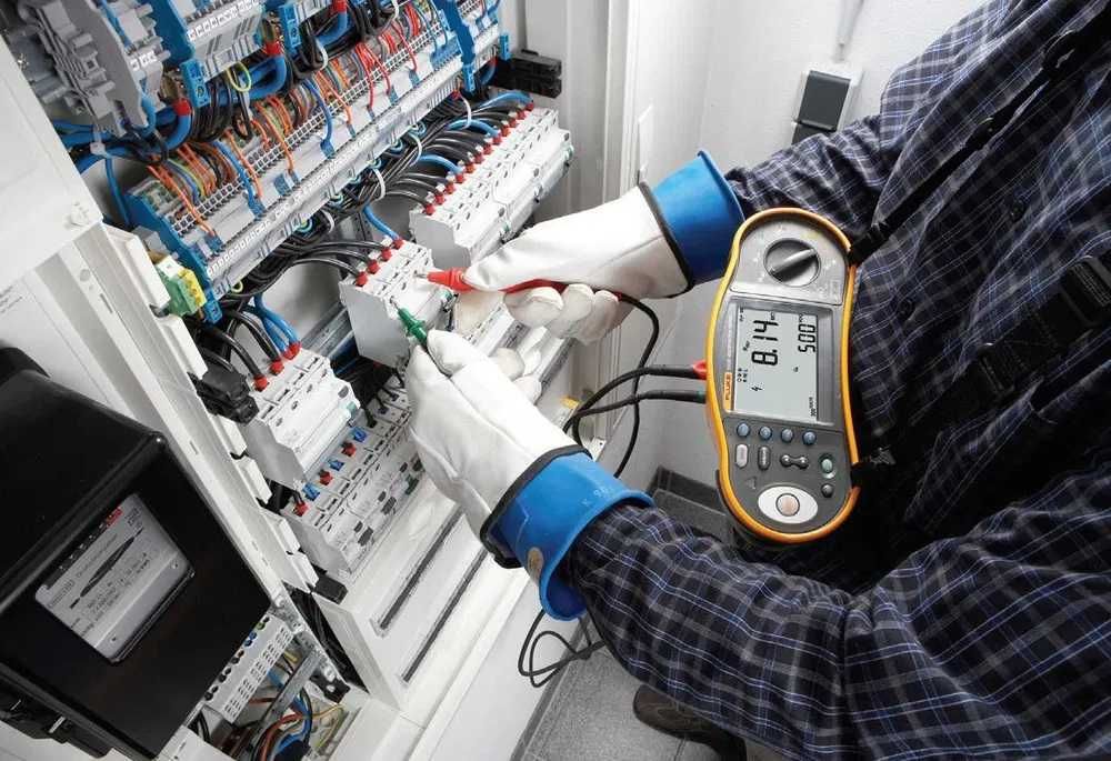 Elektryk Podłączenie płyty indukcyjnej  Pomiary Przeglądy Instalacje