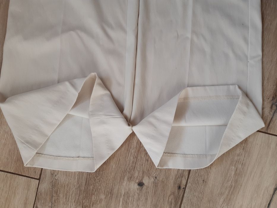 Spodnie kremowe eleganckie