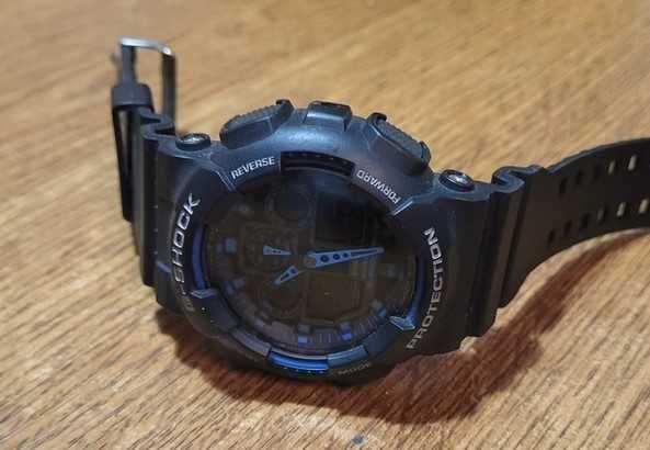 Casio G-Shock GA 100-1A2ER
Black/ Blue как новые