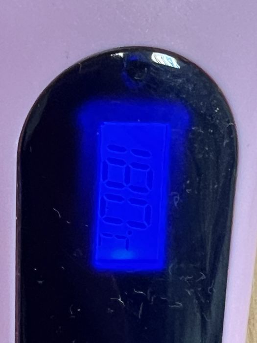 Електрична розчіска виправляч