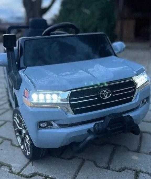 Дитячий електромобіль Тойота Крузак пульт музика світло детский EVA
