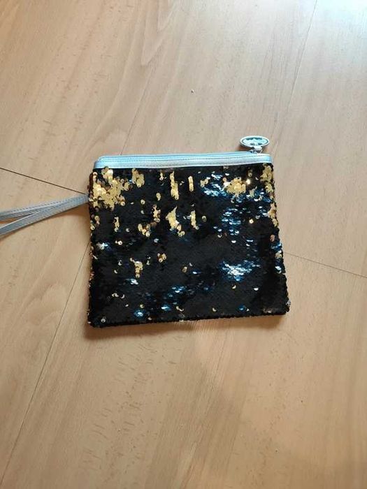 Mala de mão tipo clutch