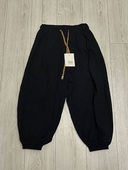 Широкі чоловічі штани.