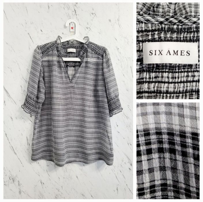 Bluzka w kratę ze stójką bufiaste rękawy ozdobne ściągacze