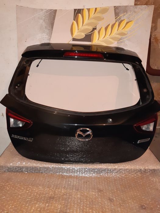 Кришка багажника оригінал Mazda 2 2014-2021