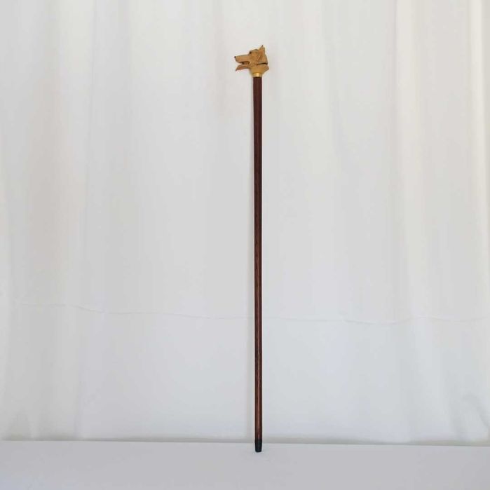 Bengala com cabeça de cão pastor esculpida