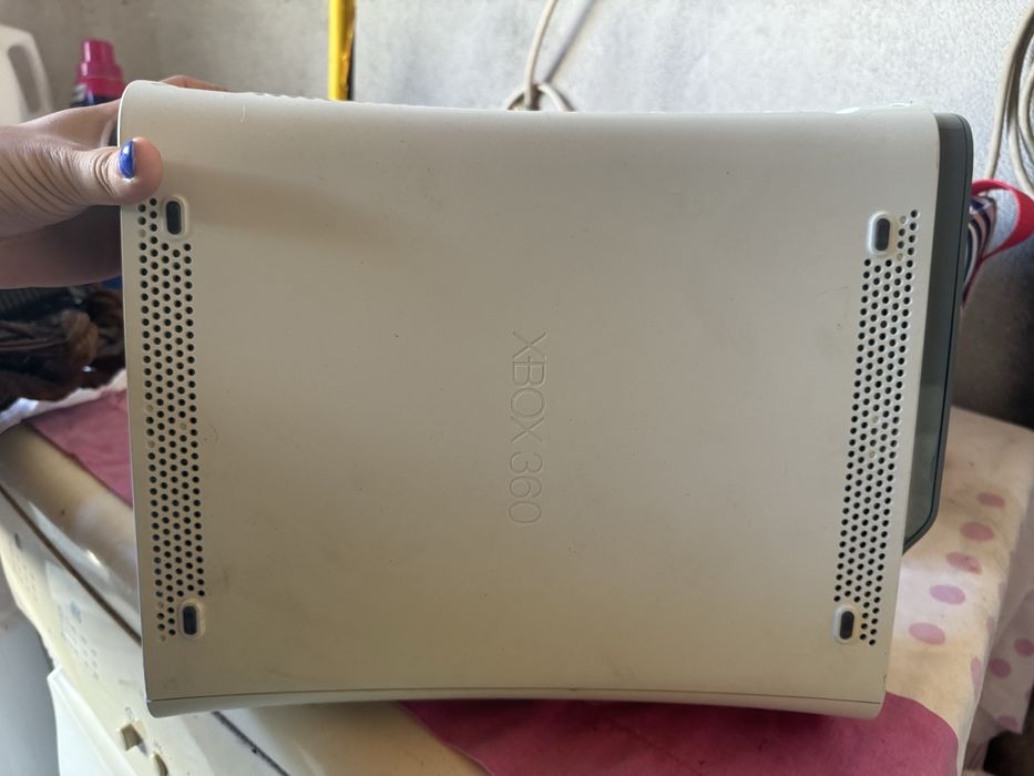 Xbox 360 usada com carregador