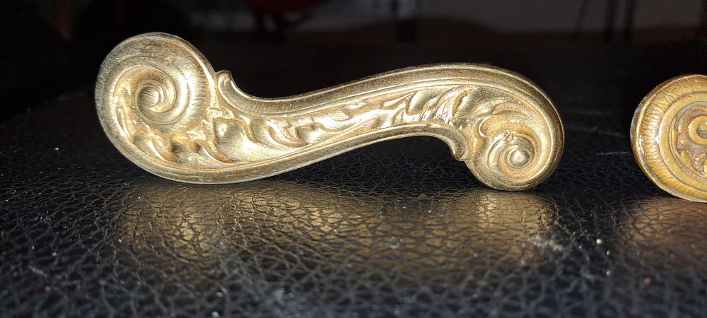 Klamki  mosiężne .