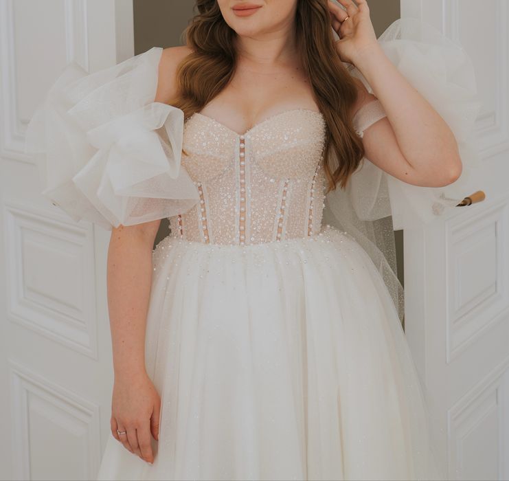 Весільна сукня .