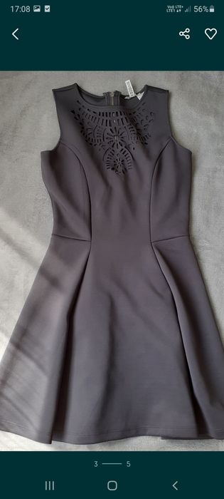 Szara sukienka wycinany wzór