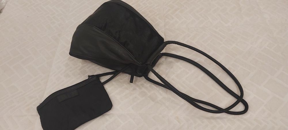 Carteira em pele,praticamente como nova