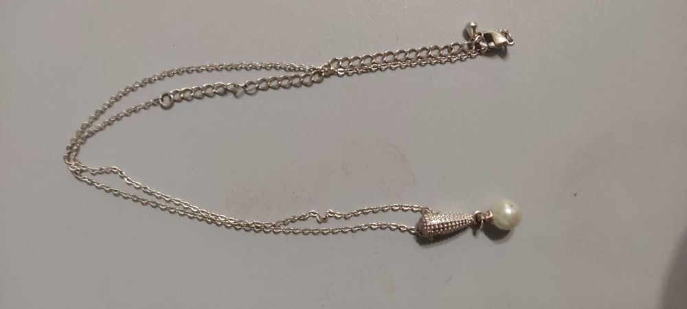 Продається  з підвіска перликою