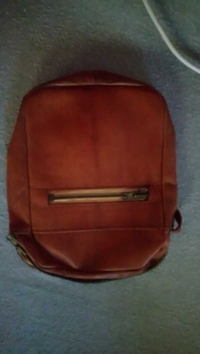 Męska saszetka skórzana do ręki