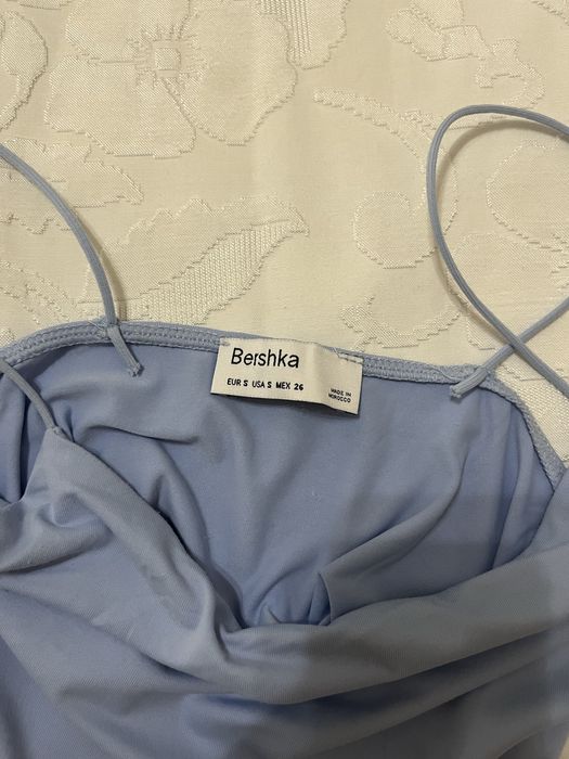 Top azul claro em bom estado