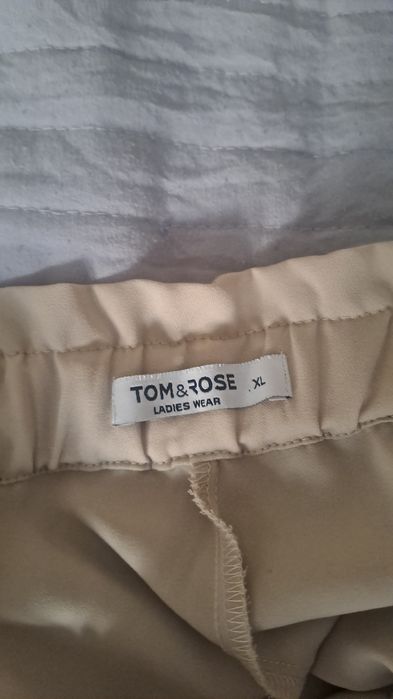 Spodnie eleganckie beżowe L/ XL