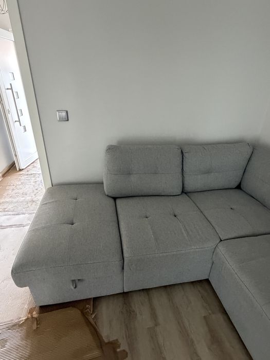 Sofa de canto cinzento