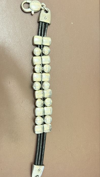 Pulseira em aco e pele preta