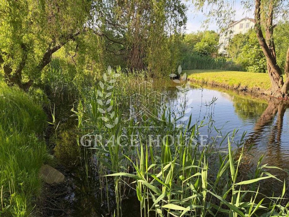 Продаж будинку 467м з виходом на воду Конча-Заспа Козин 10 соток біля озера Лугова Обухівський район будинок біля води 5 спалень в тихому місці Козина