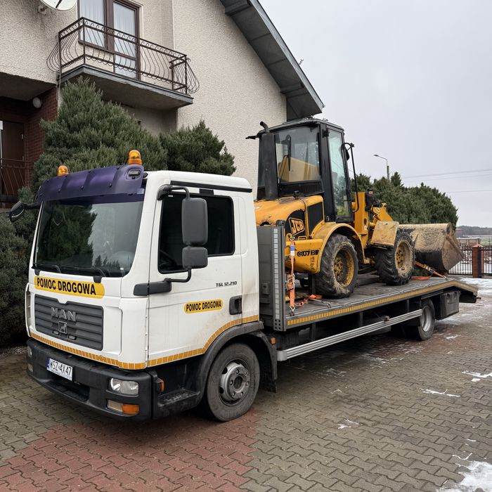 Pomoc drogowa, holowanie, laweta transport maszyn budowlanych rolnicze