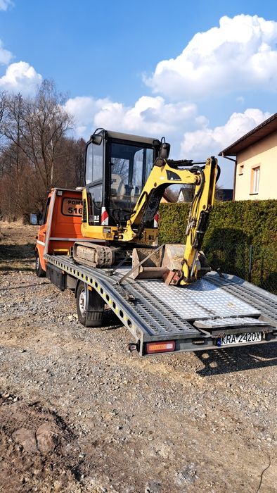 Pomoc drogowa Laweta Holowanie 24h/7