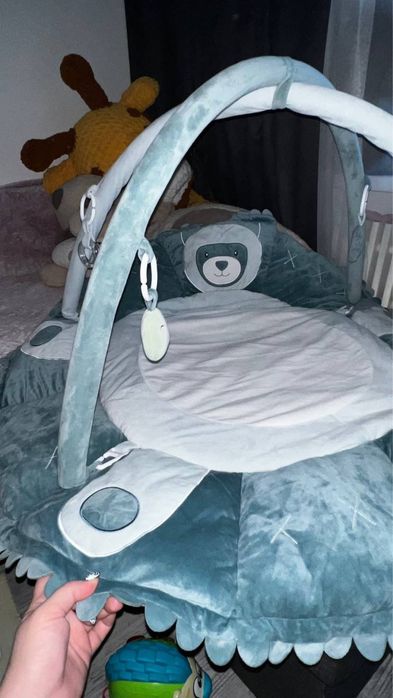 Розвиваючий  килимок Bambinelli "Єнот Алекс" з дугами.