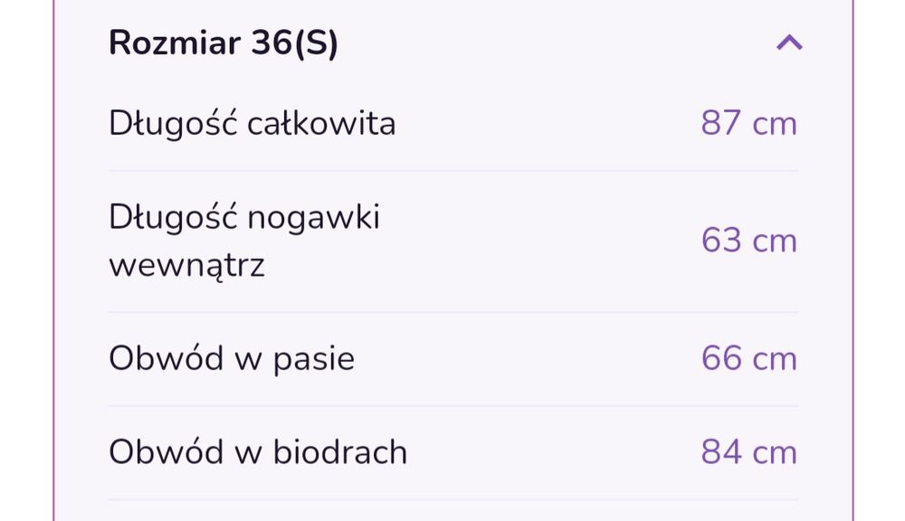 Pudrowe spodnie w kratę