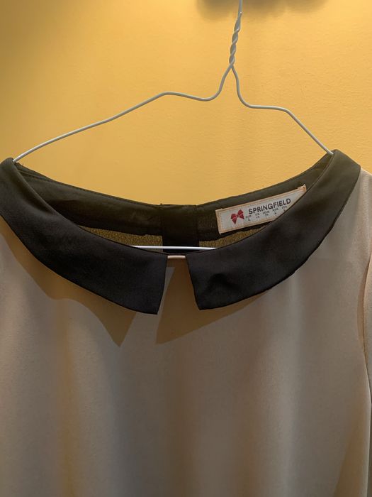 Blusa t-shirt mulher dourada/preta formal tamanho L “Springfield”