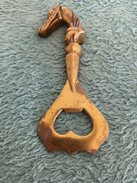 Abre cápsulas e  mini cinzeiro