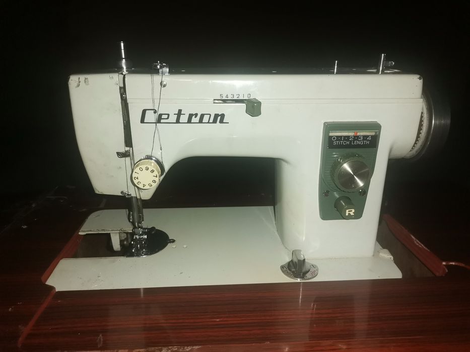Máquina de costura64585696569730122