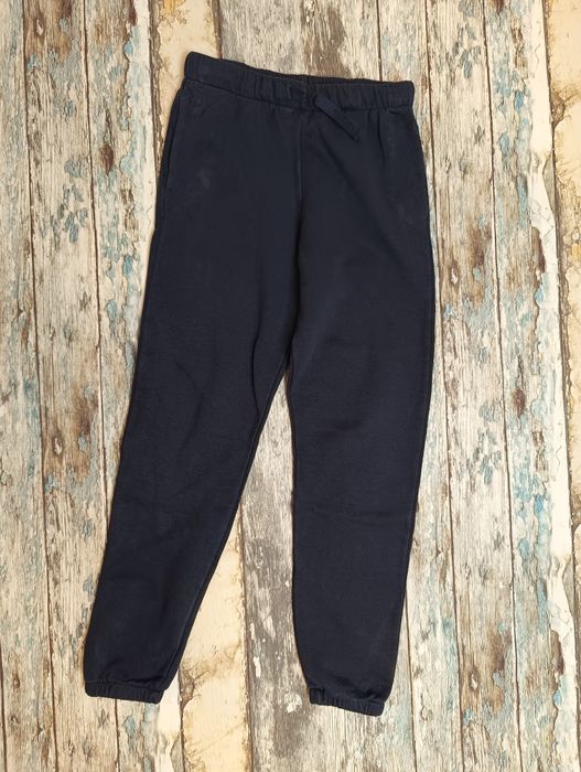 Granatowe spodnie dresowe H&M, Rozm 140
