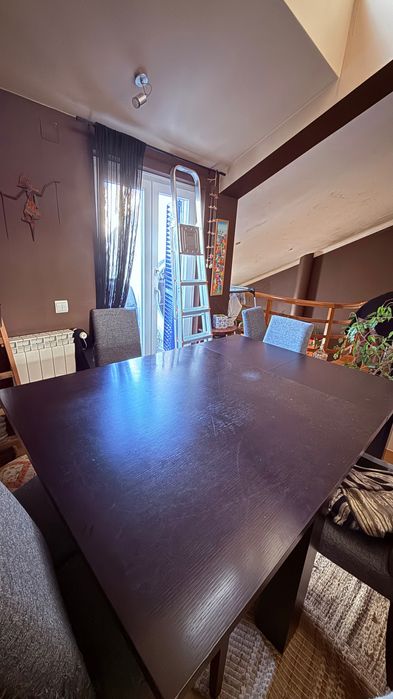 Mesa de madeira maciça extensível