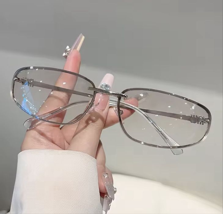 Жіночі окуляри miu miu