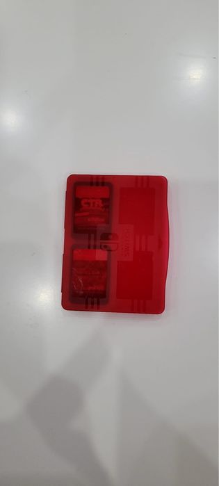 Nintendo Switch + Cartão microSD 128 GB + 2 Jogos