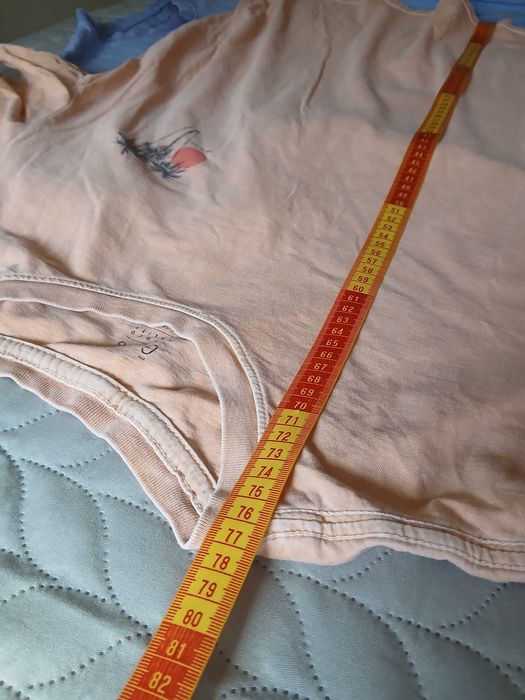 T shirt cor salmão com palmeira e pôr do sol