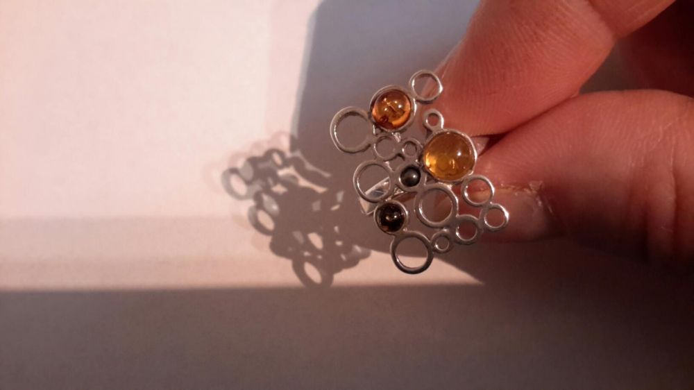 Nowy efektowny Srebrny pierścionek z bursztynami W.Kruk roz. 13 tanio