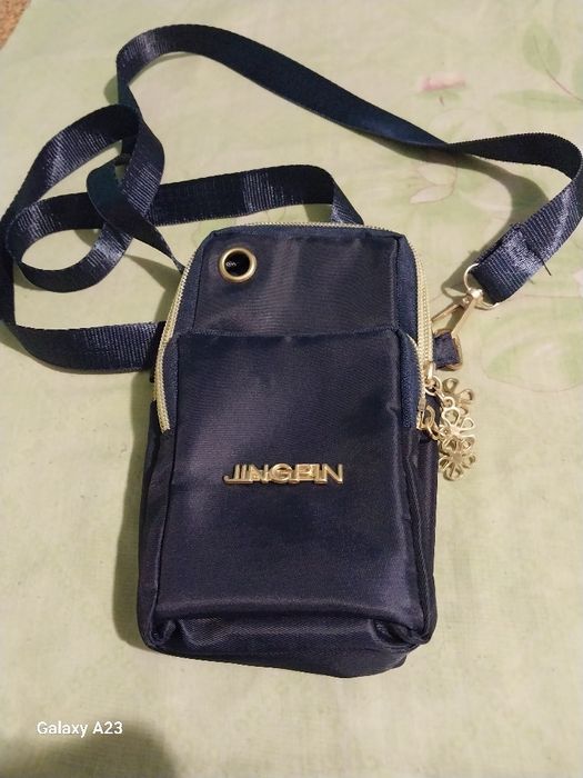 Клач-гаманець новий