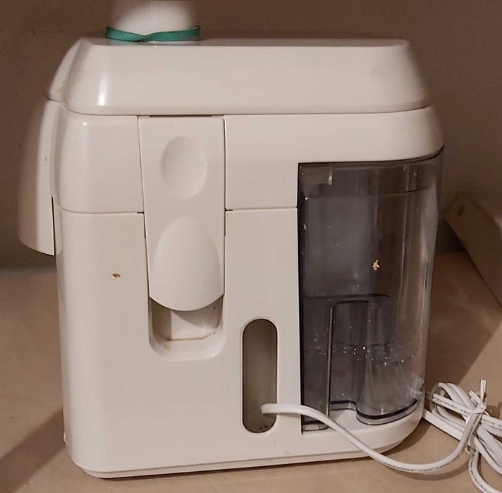 Máquina de sumos - Espremedor de Fruta