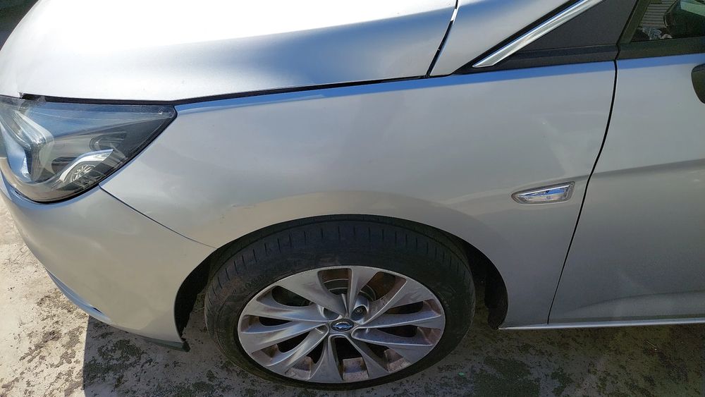 Guarda-lamas esquerdo OPEL Astra K