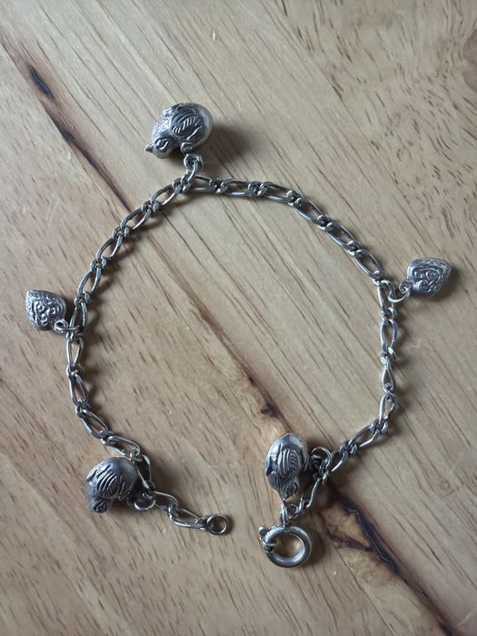 Pulseira com berlocos de prata