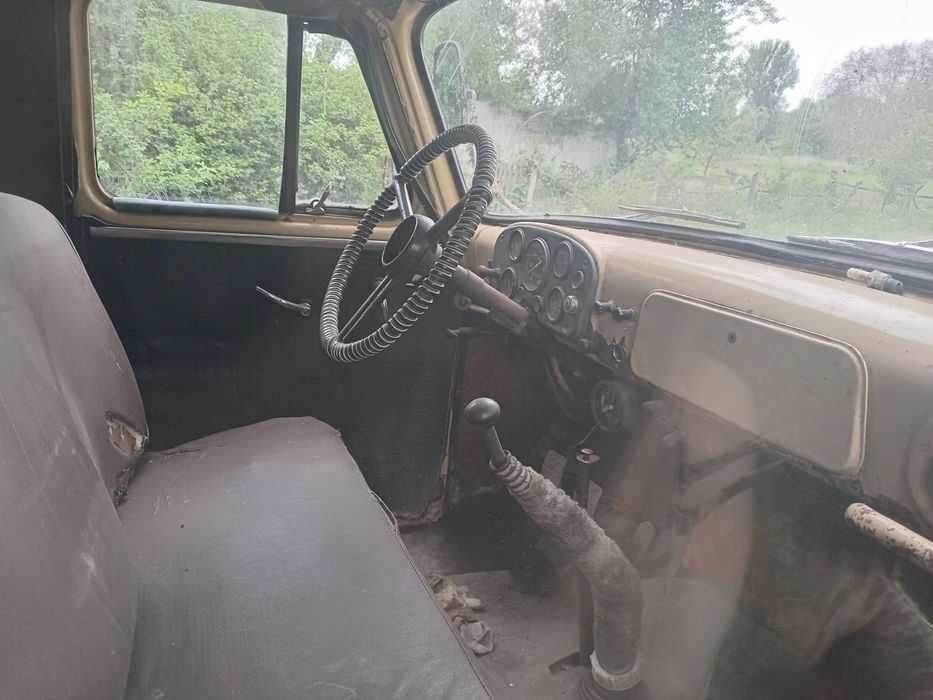 Газ 53 бортовий..
