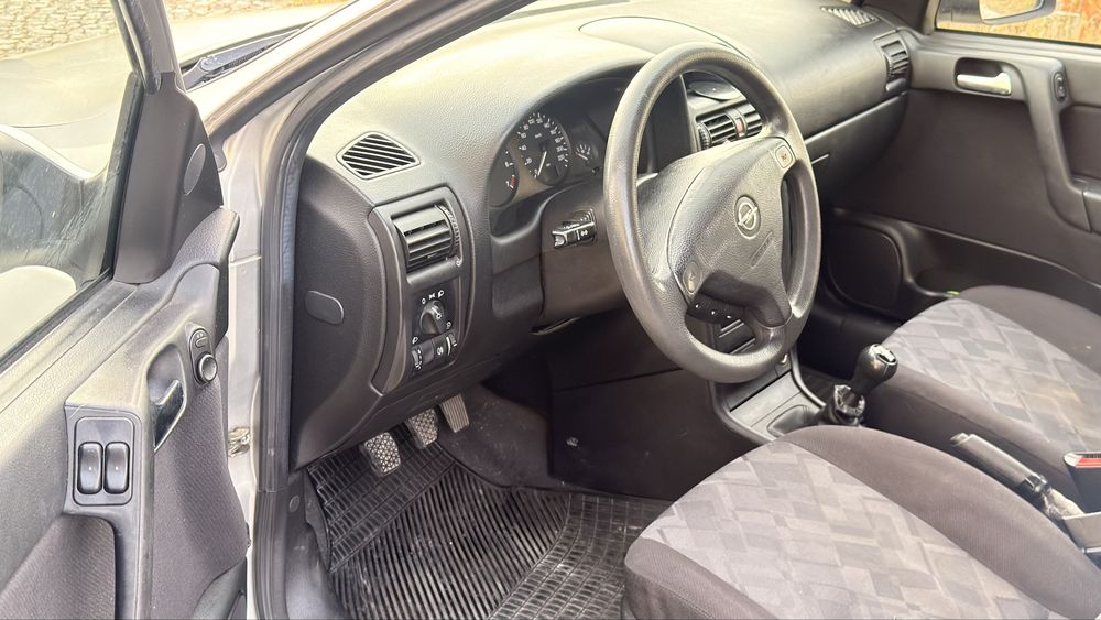 Opel 4 portas 165 mil km motor impecavel 2mil