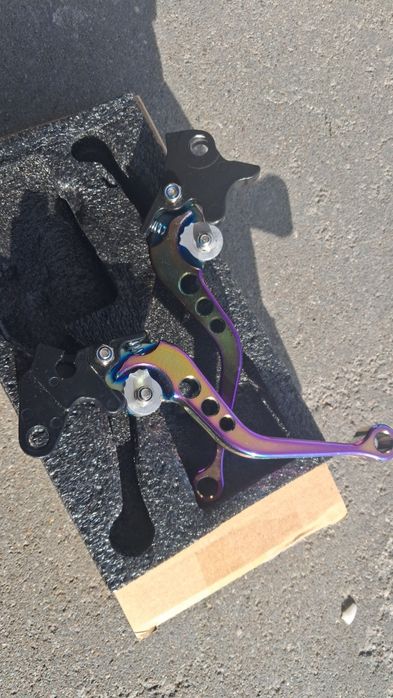 Klamki motocyklowe regulowane dzwignia