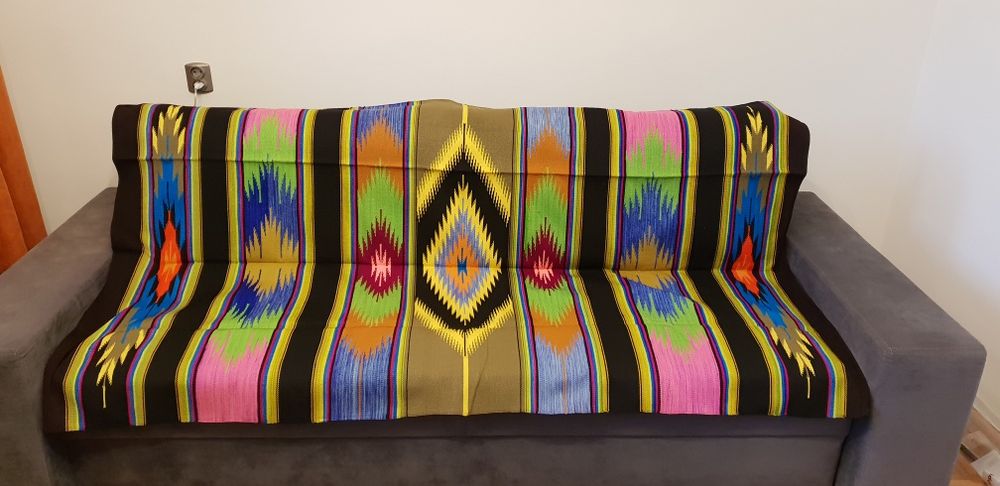 Narzuta,  kilim, kapa na łóżko w stylu vintage