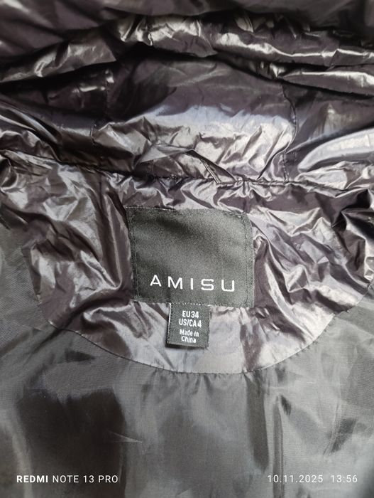 Жіночий зимовий пуховик , чорного кольору